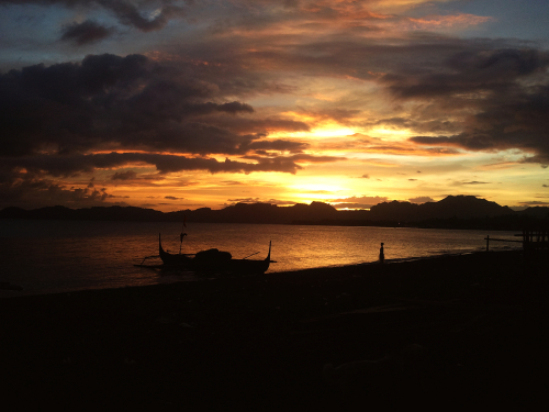 smal girl watching the sundown